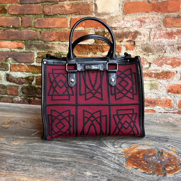 Borsa con disegno ricamato