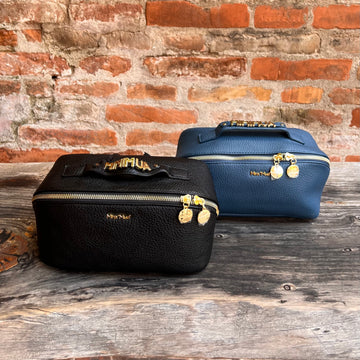 Borsa beuty tre pezzi Logo